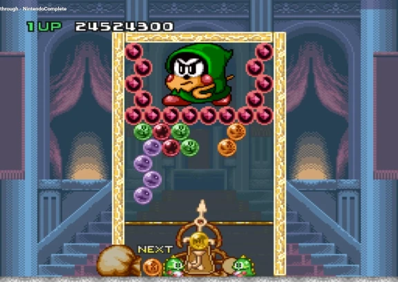 Bust-A-Move 2 puzzle layout emphasizing precision banks