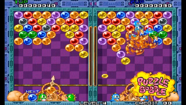 Puzzle Bobble arcade screenshot showing a match setup and ricochet shot angles