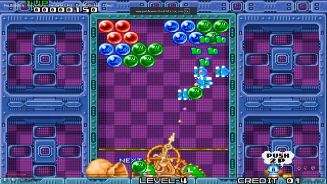 Puzzle Bobble arcade board state with descending bubble pressure